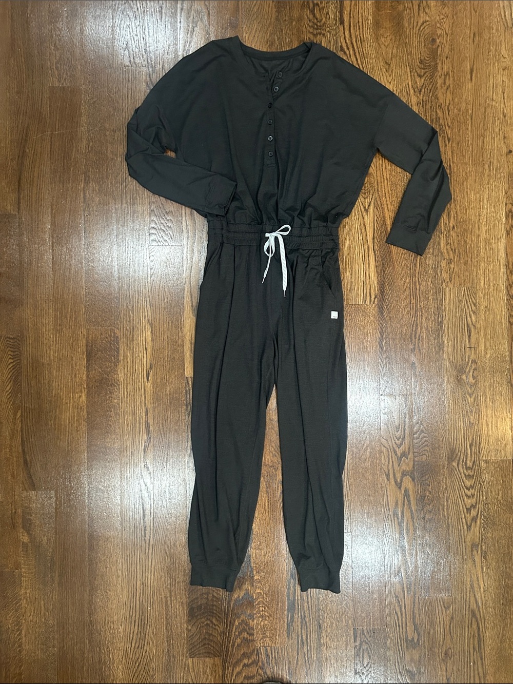 Vuori Lux Henley Heather Black women’s Long Sleeve Jumpsuit w/ Drawstring Waist